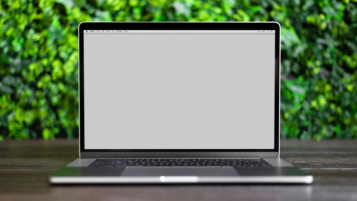 Laptop showing website builder options for a small business