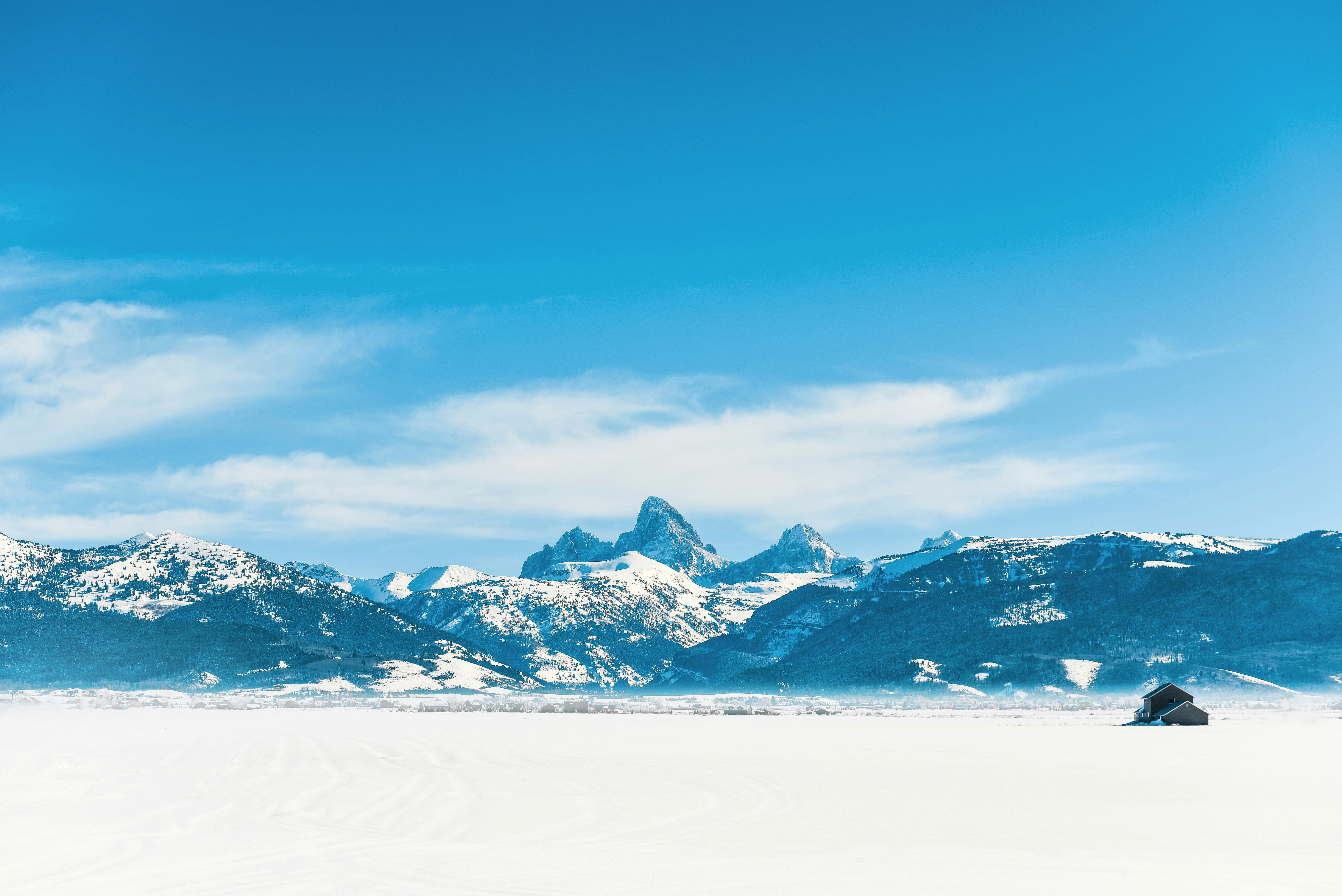 snow covered mountain under blue sky during daytime