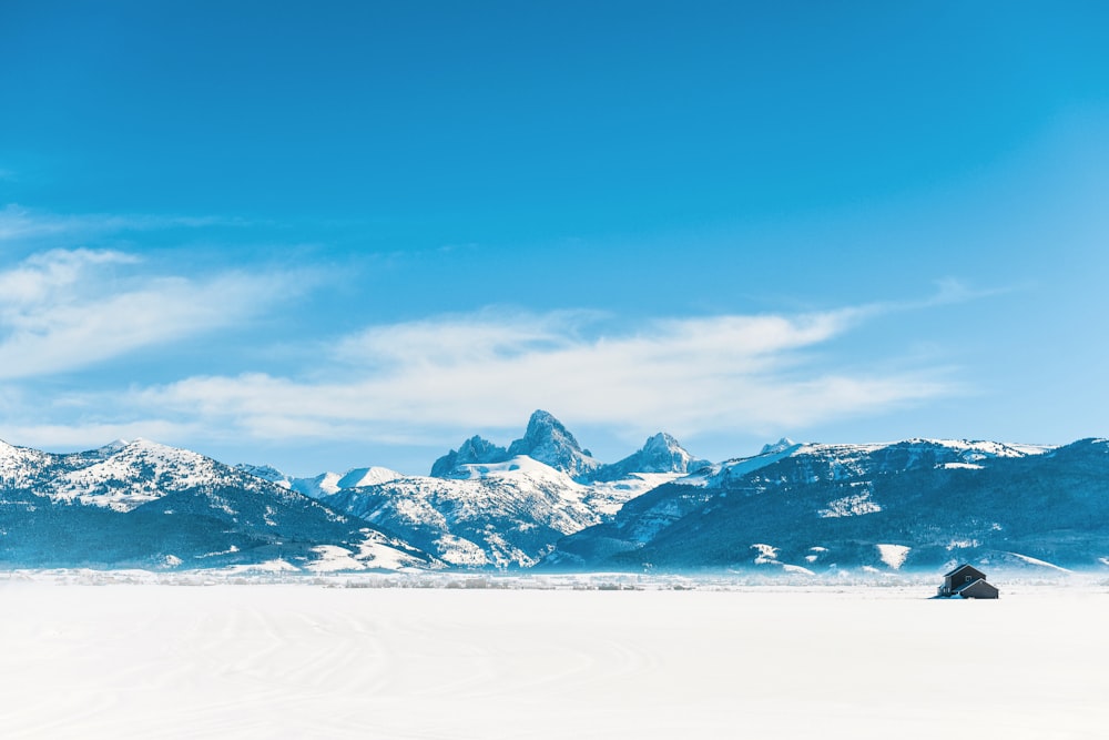 snow covered mountain under blue sky during daytime