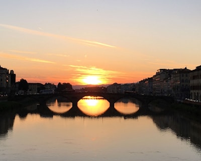 A beautiful sunset over the banks of a river.