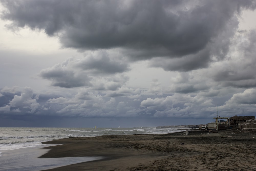 white and black clouds over the sea