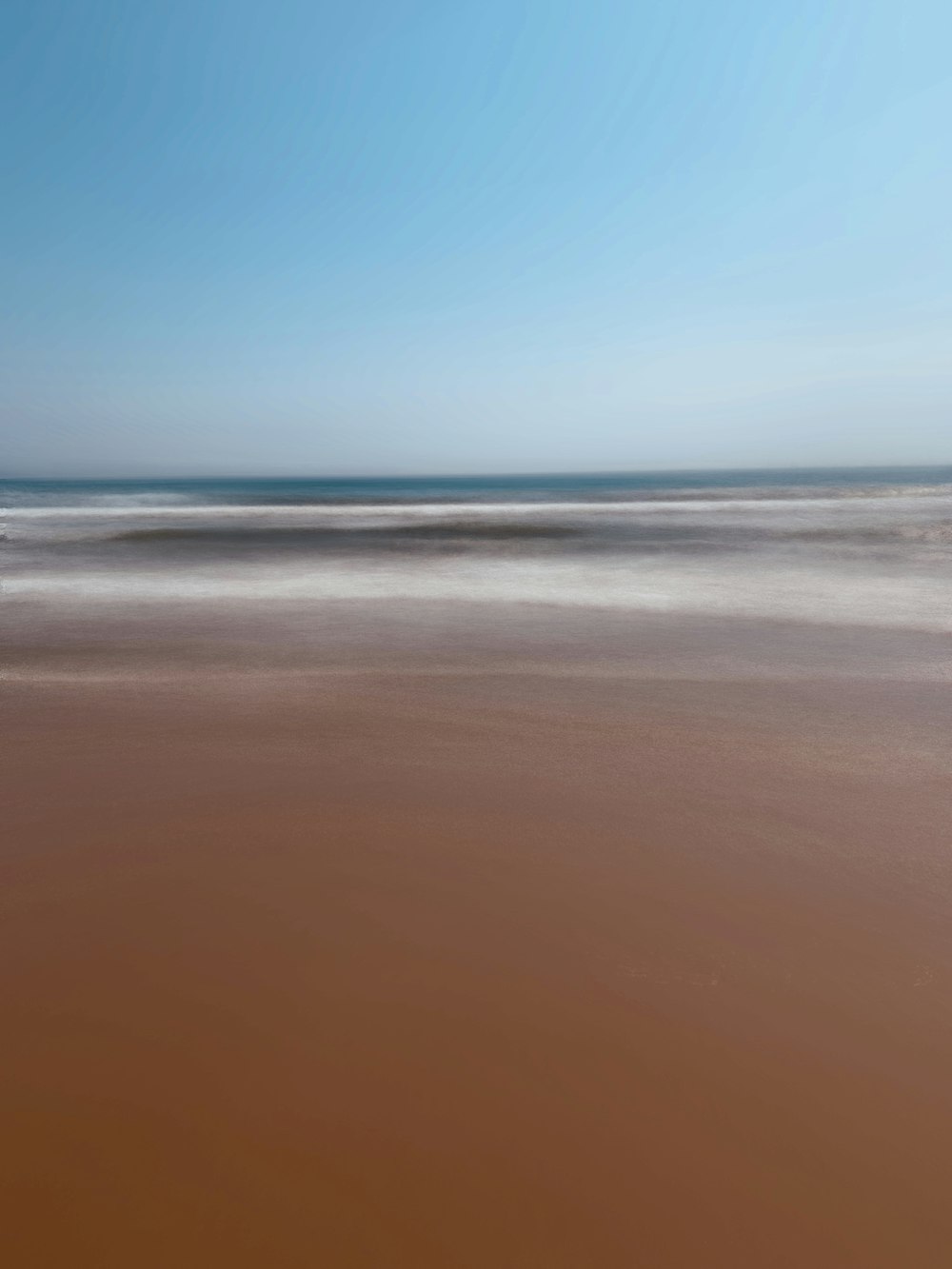 blue sea under blue sky during daytime