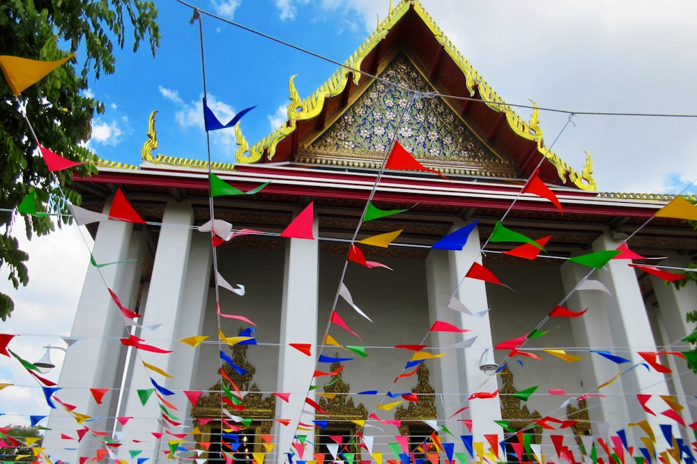 red and white temple under blue sky during daytime