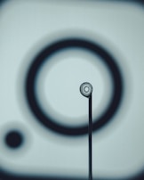 A minimalist sketch of interconnected circles representing ideas linking.