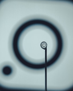 A minimalist sketch of interconnected circles representing ideas linking.