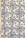 Blue and white ceramic tiles featuring ornate floral patterns with symmetrical designs. The tile arrangement is consistent and repeats across the surface, showcasing a traditional and decorative style.