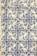 Blue and white ceramic tiles featuring ornate floral patterns with symmetrical designs. The tile arrangement is consistent and repeats across the surface, showcasing a traditional and decorative style.