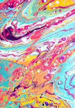 A vibrant abstract painting with flowing colors and shapes.