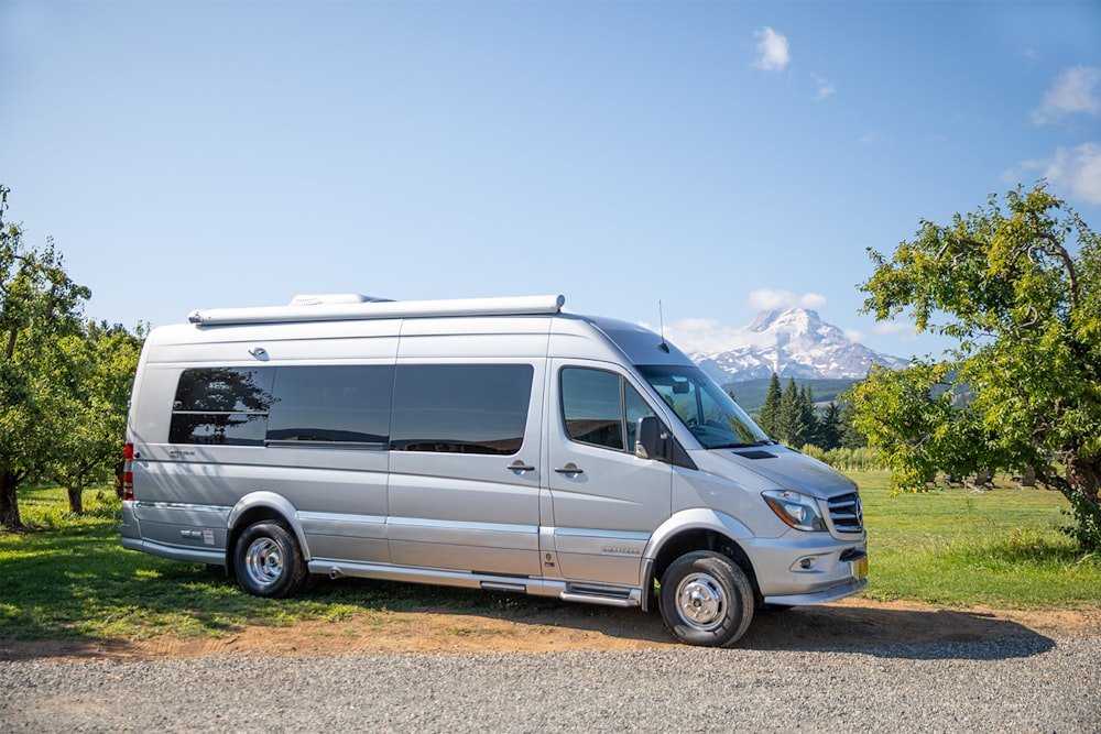 white van on road during daytime