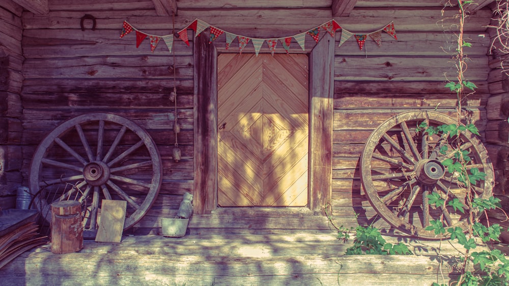 brown wooden door with wheel and tire