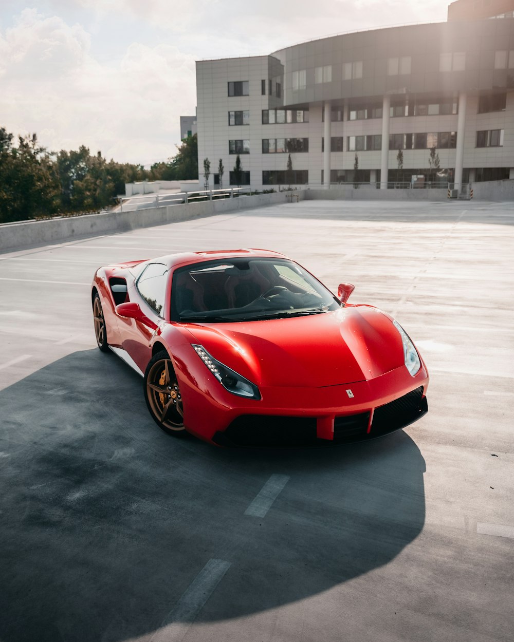 red ferrari 458 italia on road