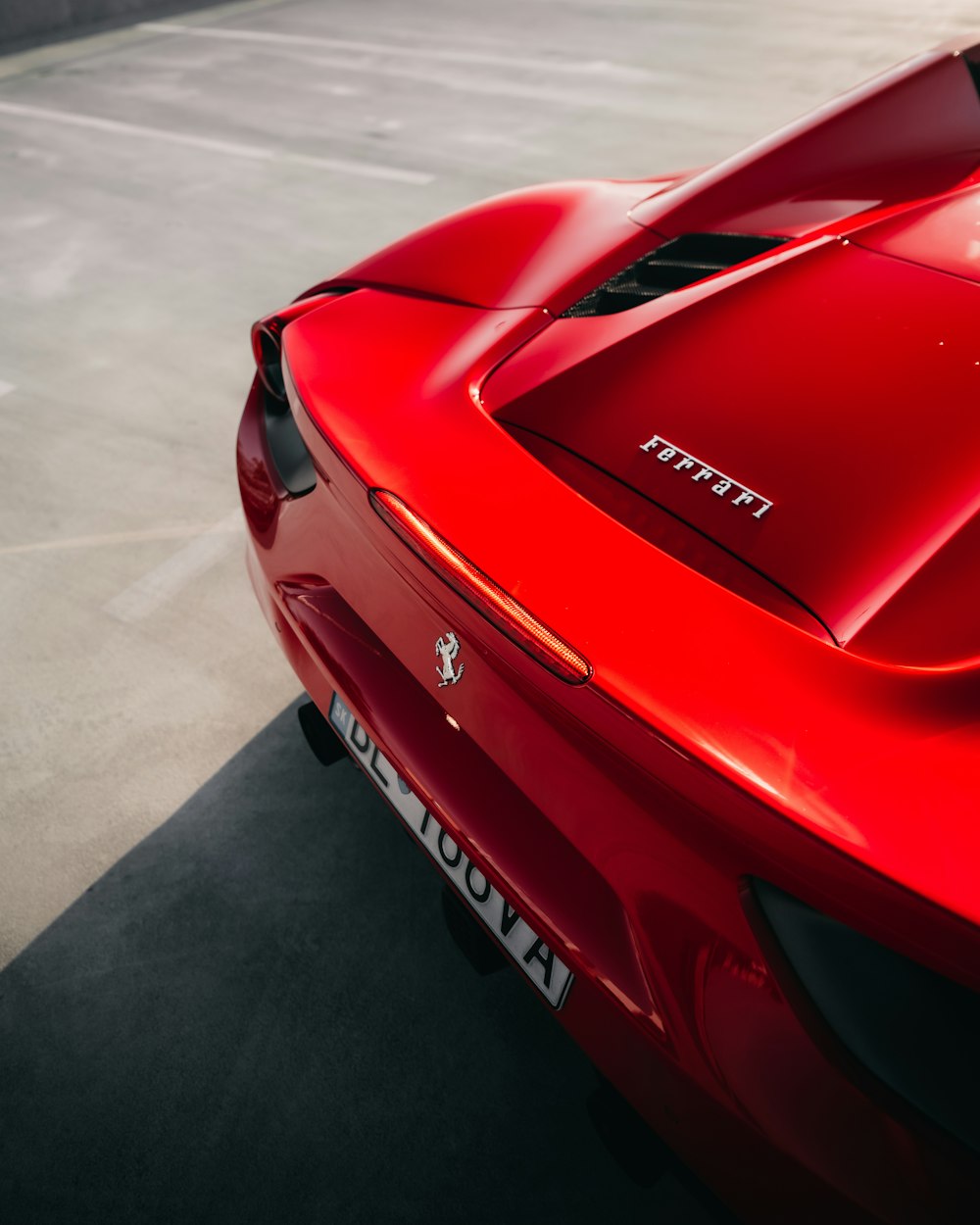 red ferrari 458 italia on road