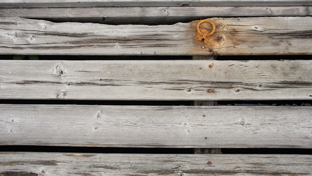 brown wooden plank with brown rope