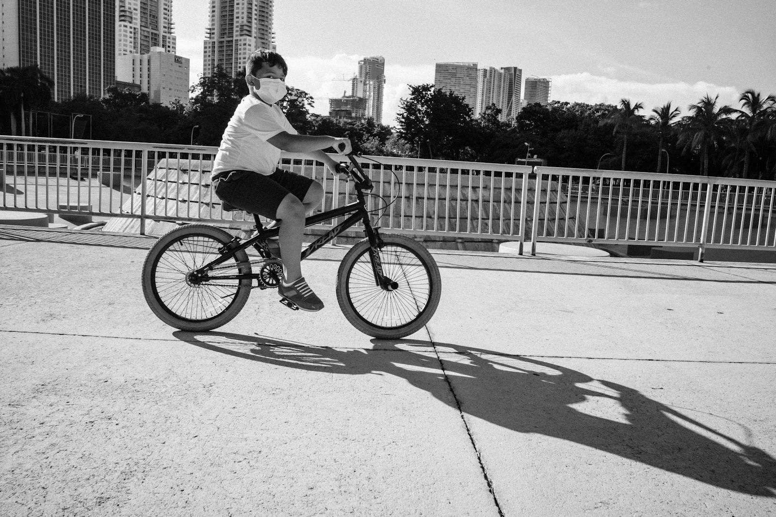 Leica M10 sample photo. Man riding on bicycle photography