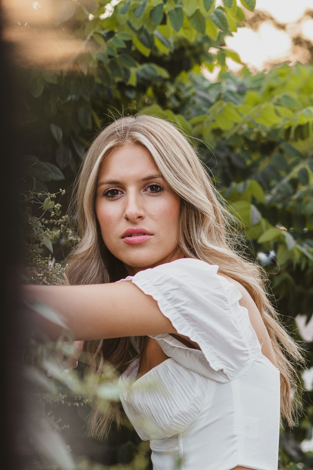 woman in white shirt smiling