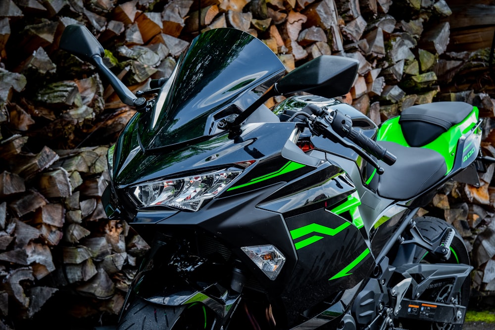 green and black motorcycle helmet