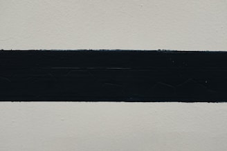 black textile on white surface
