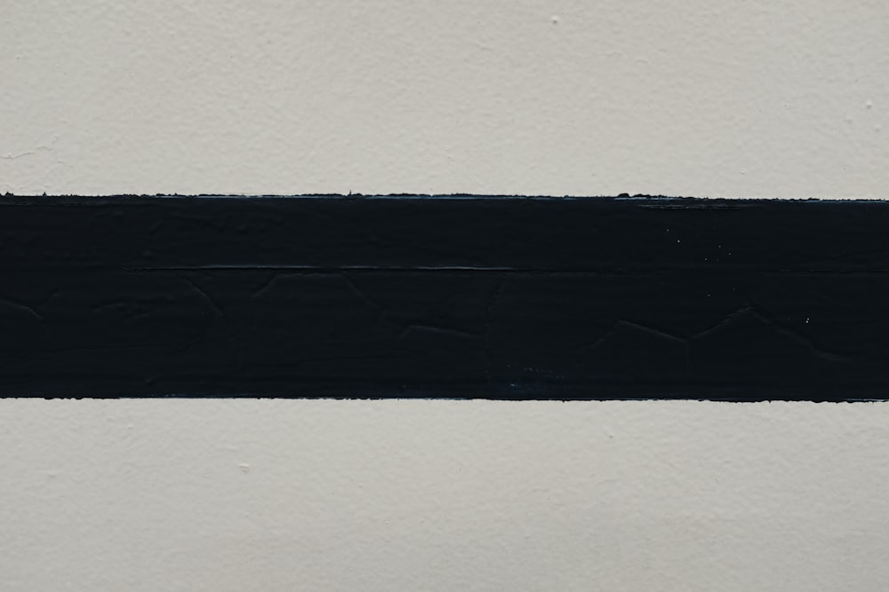 black textile on white surface