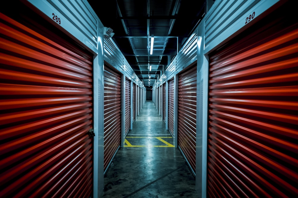 red and black tunnel with red metal wall