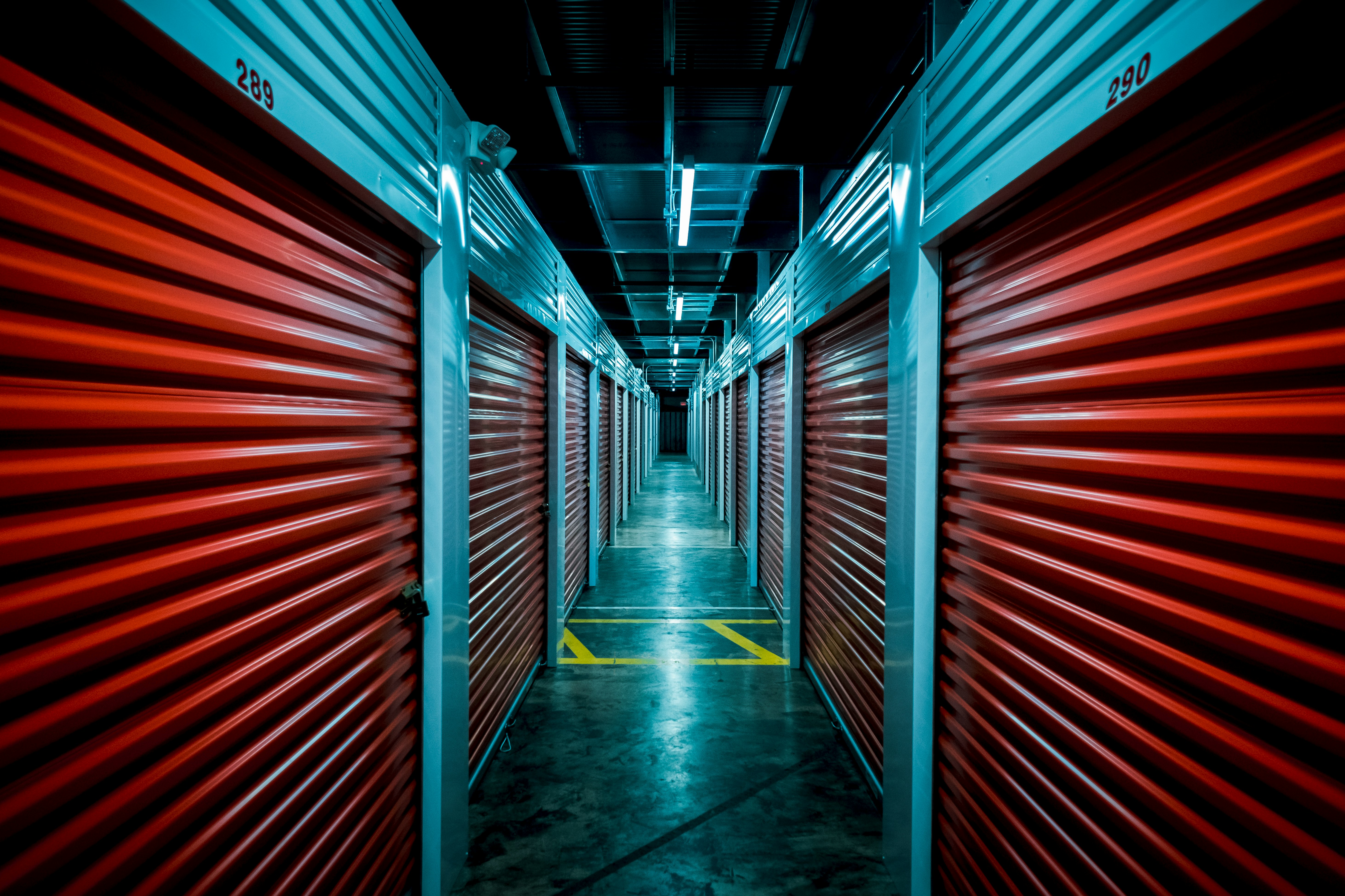 red and black tunnel with red metal wall