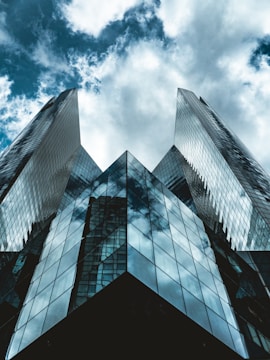 low angle photography of building under blue sky