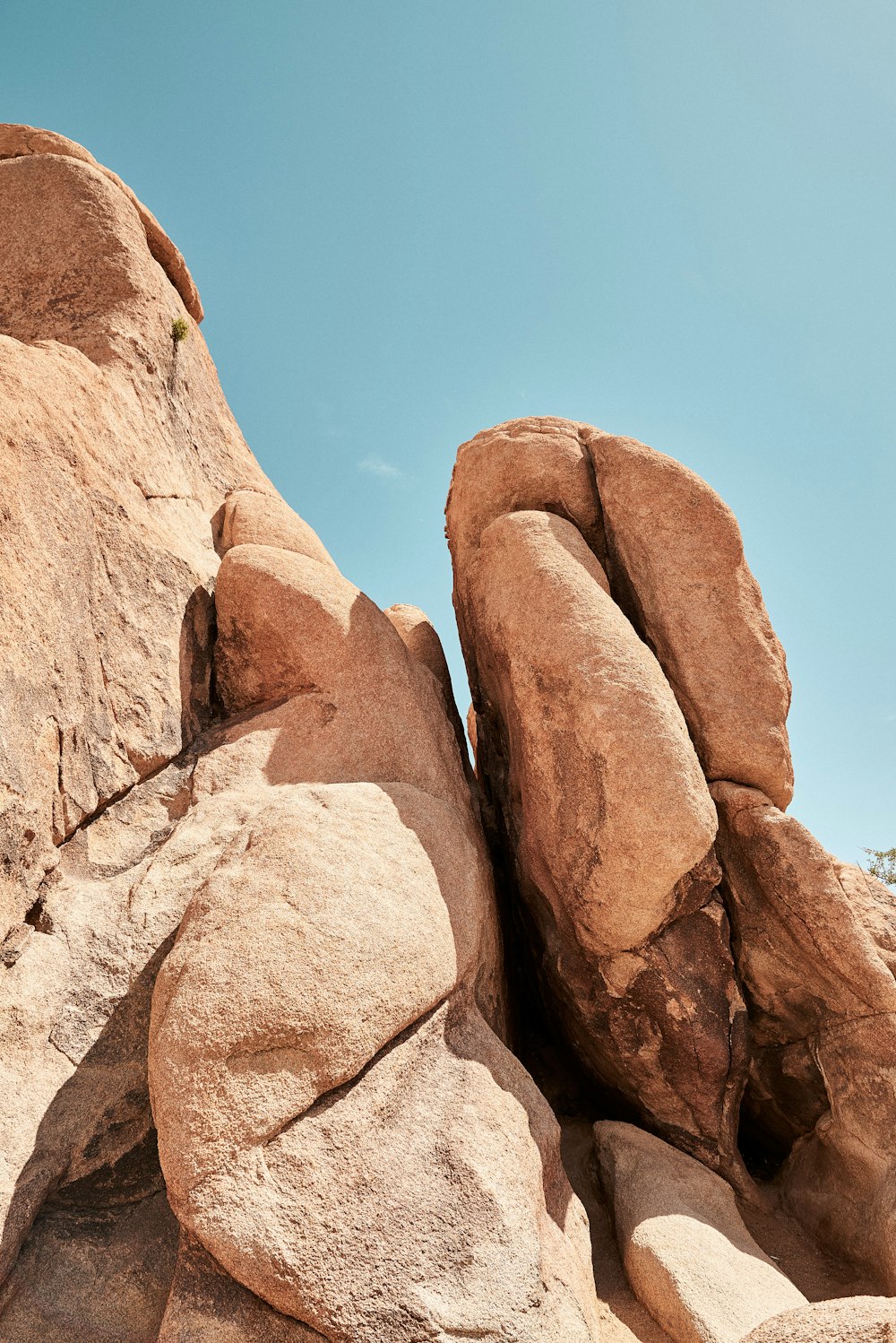 brown rock formation under blue sky during daytime