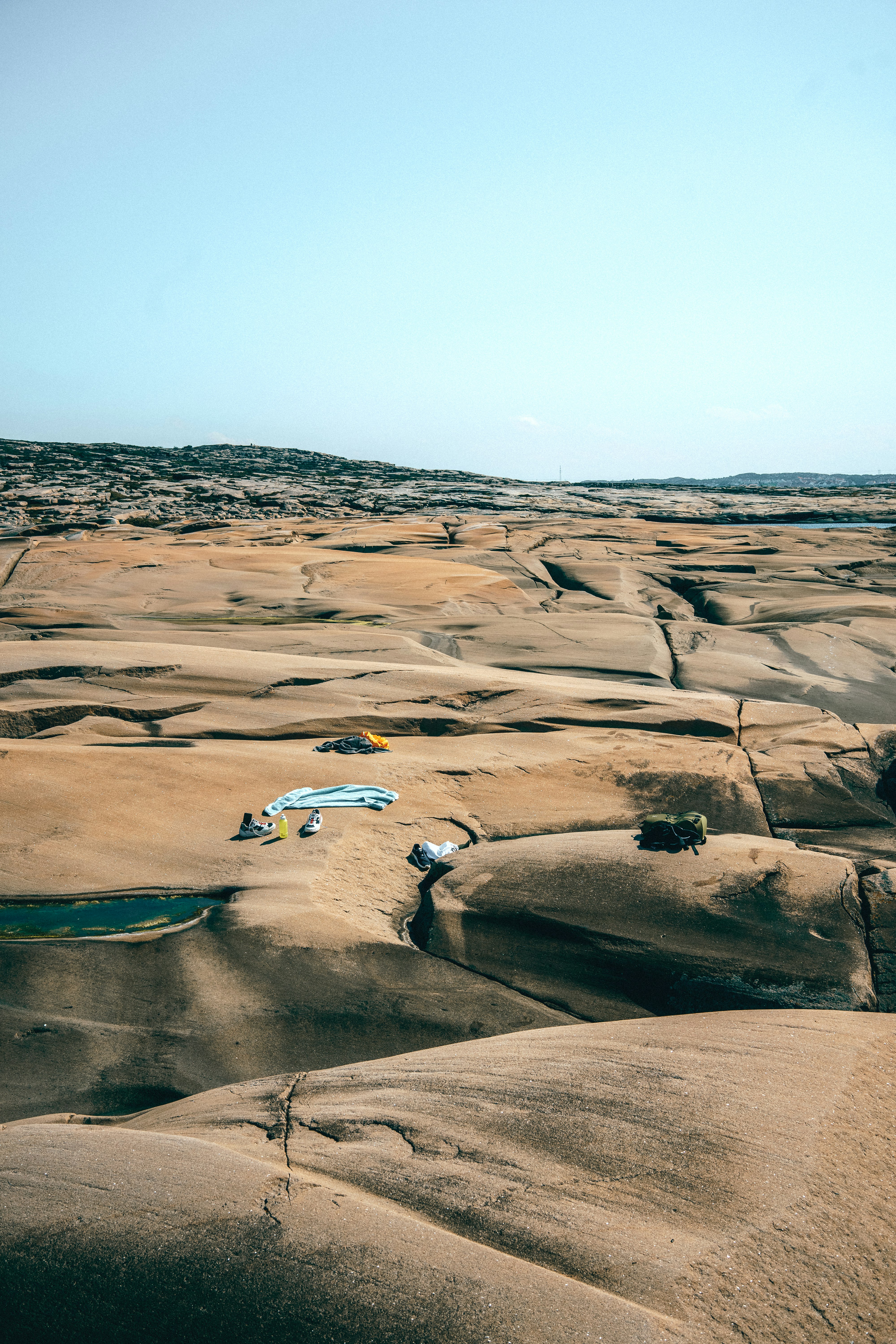 people walking on brown sand during daytime