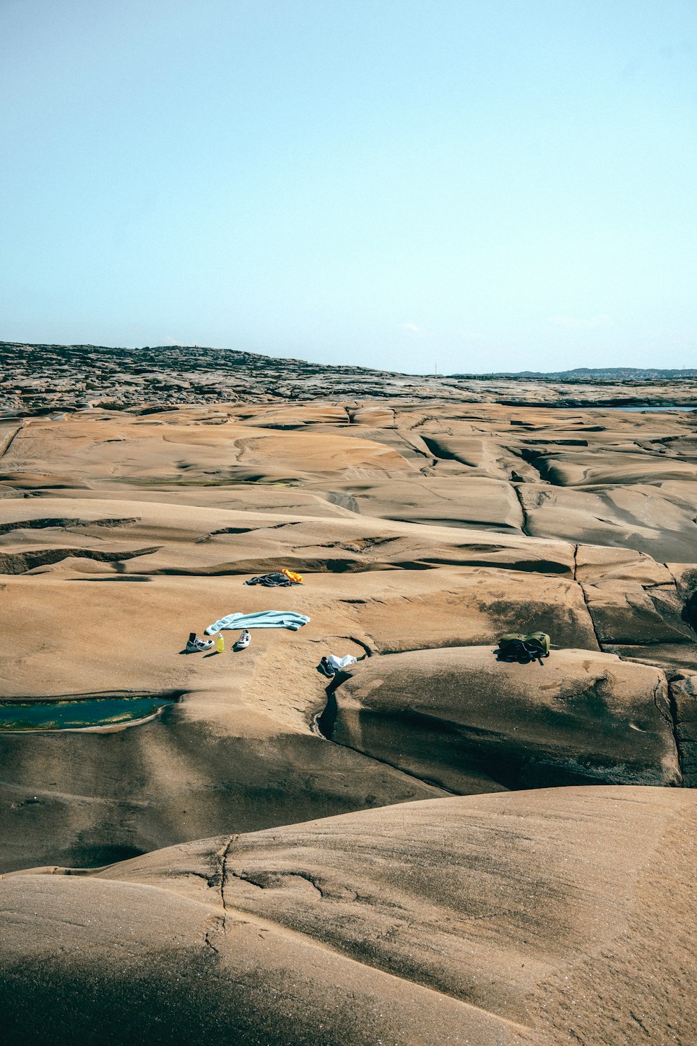 people walking on brown sand during daytime