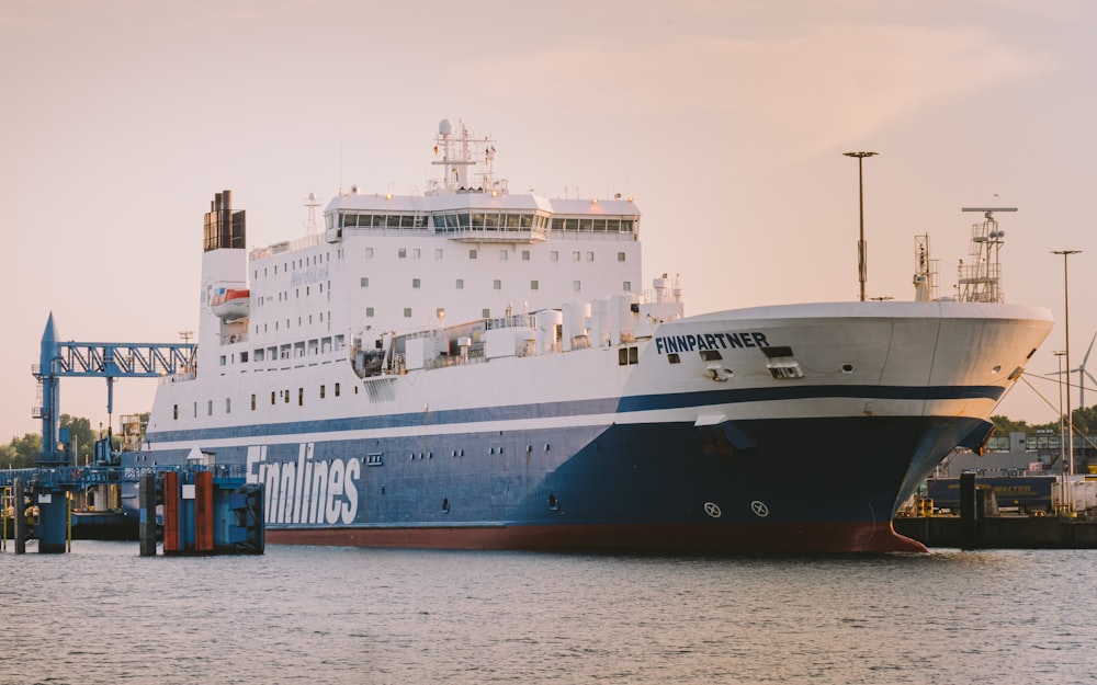 white and blue cruise ship on sea during daytime