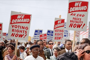 Marchers holding signs demanding the right to vote at the March on Washington