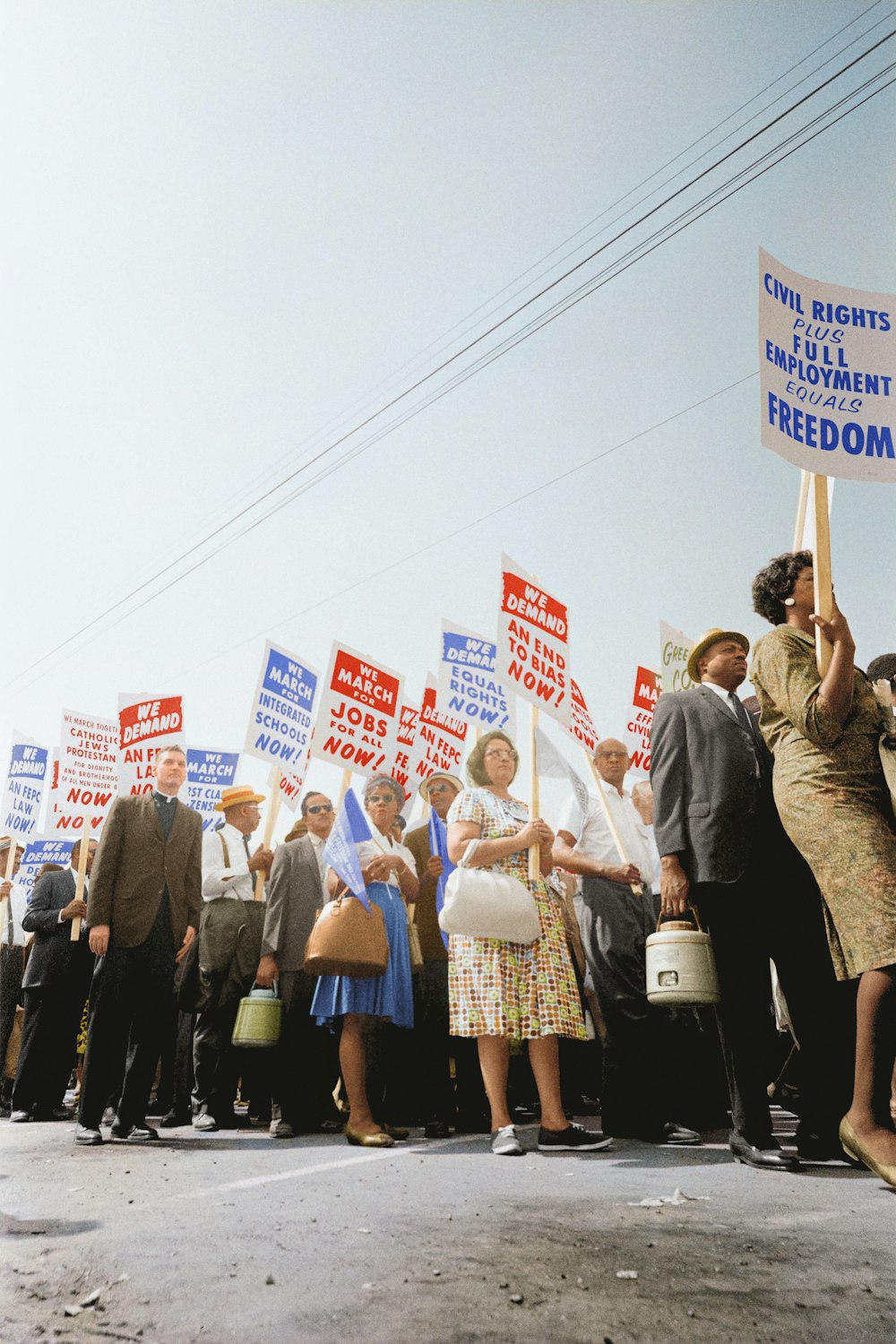 Demonstrators holding signs demanding the right to vote and equal civil rights at the March on Washington