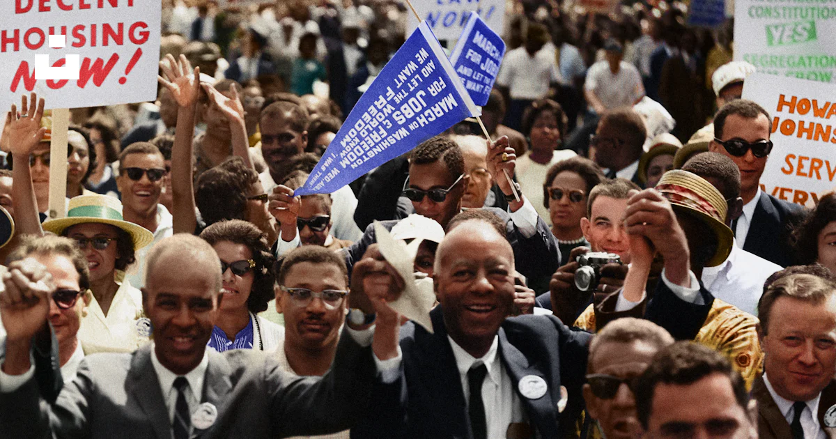 A crowd of demonstrators march during the Civil Rights March on ...