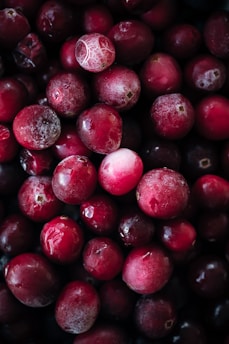 red round fruit in close up photography
