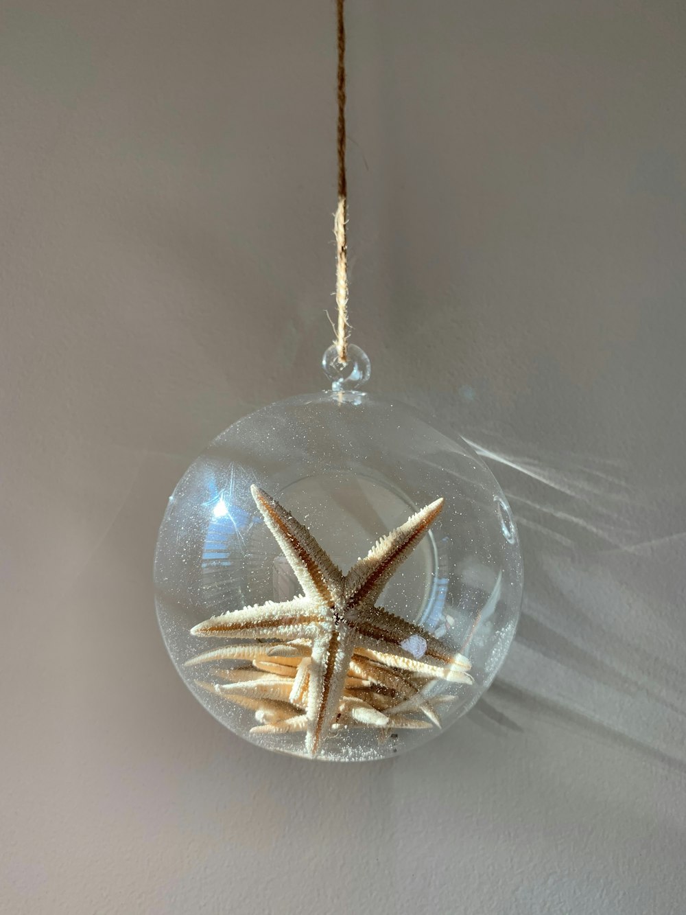 silver and gold star pendant