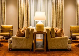 Cozy living room with seating for six guests.