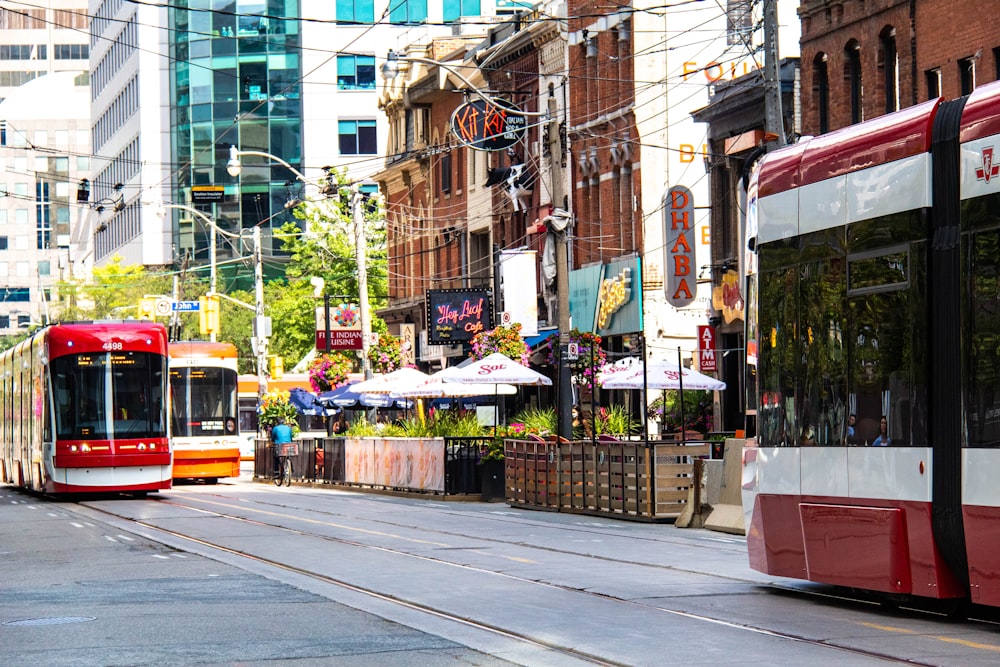 cars parked on street near buildings during daytime