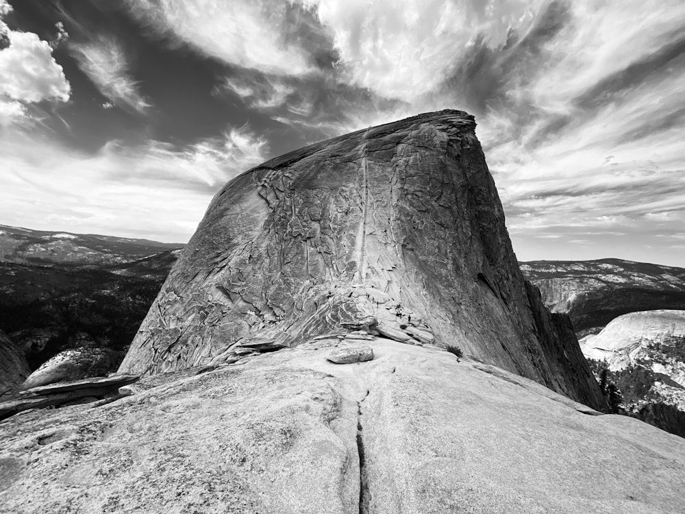 grayscale photo of rock formation