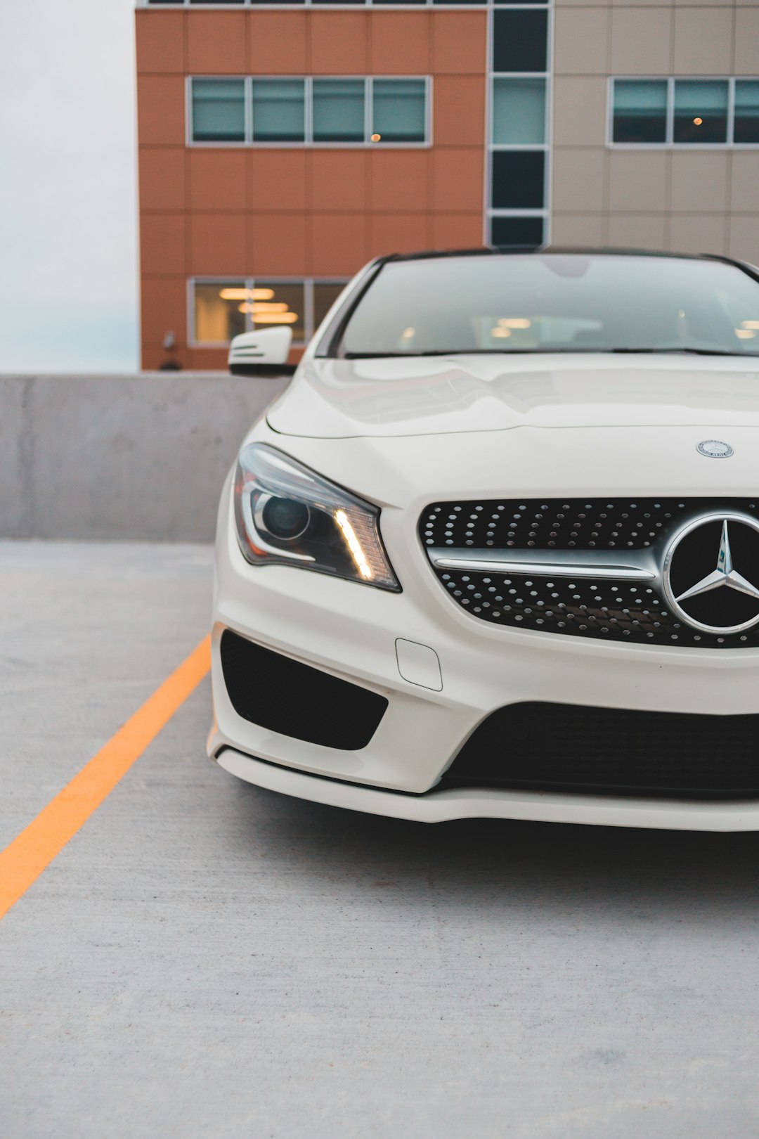 white mercedes benz car on road