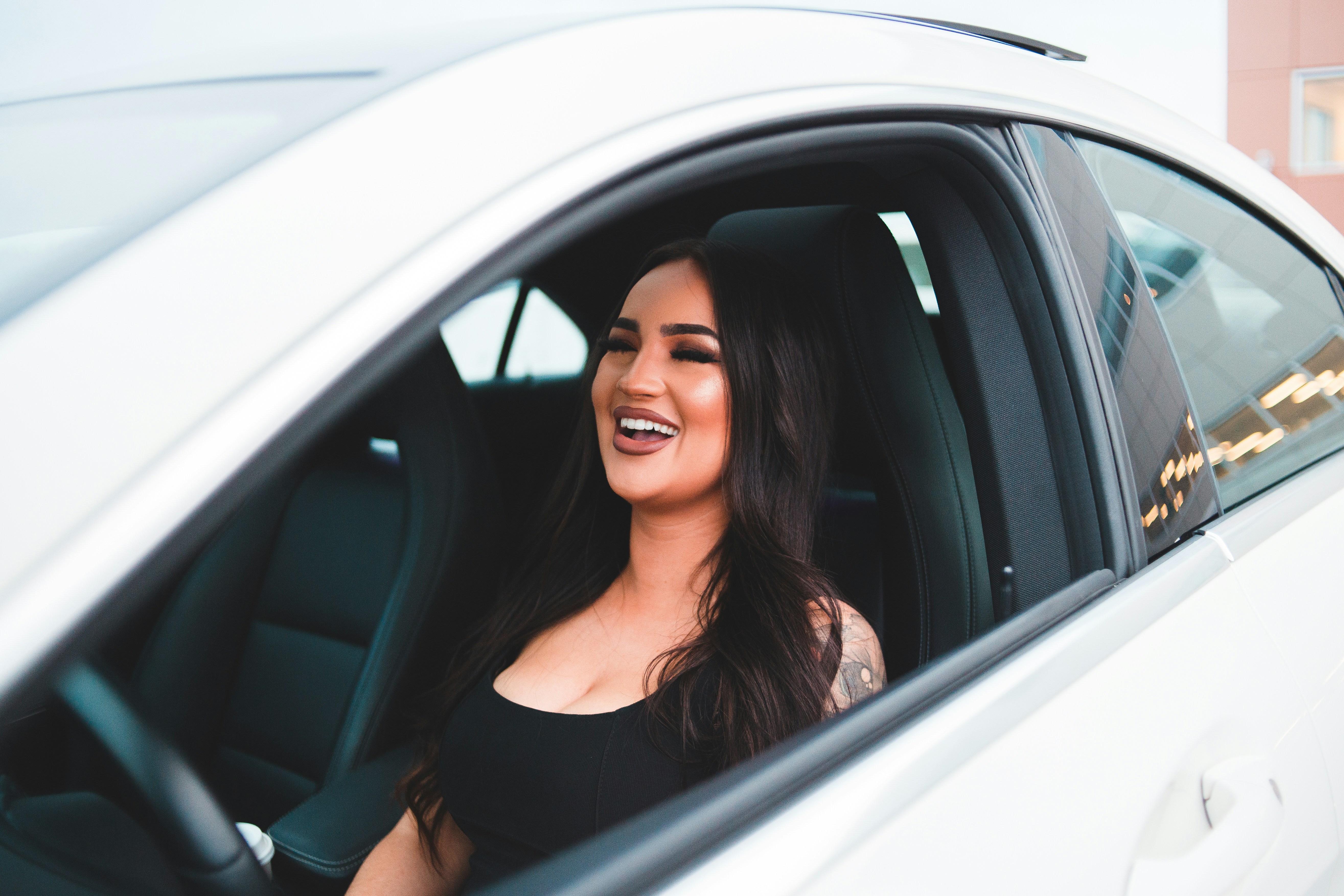 Woman smiling in car