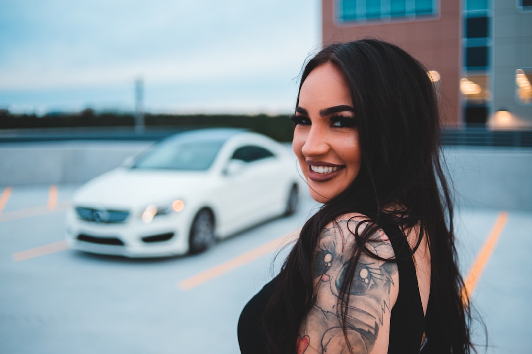 woman in black shirt smiling