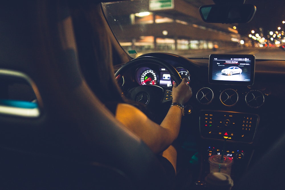 person driving car during night time