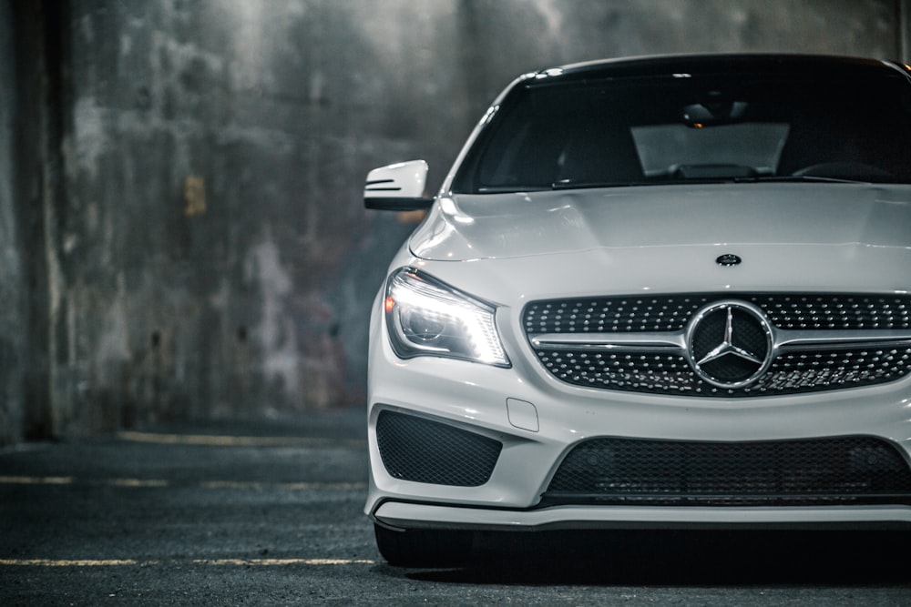 silver mercedes benz car on road during daytime