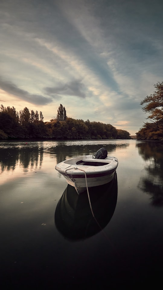 white boat on lake during daytime in Viedma Argentina