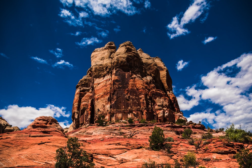 brown rock formation under blue sky during daytime