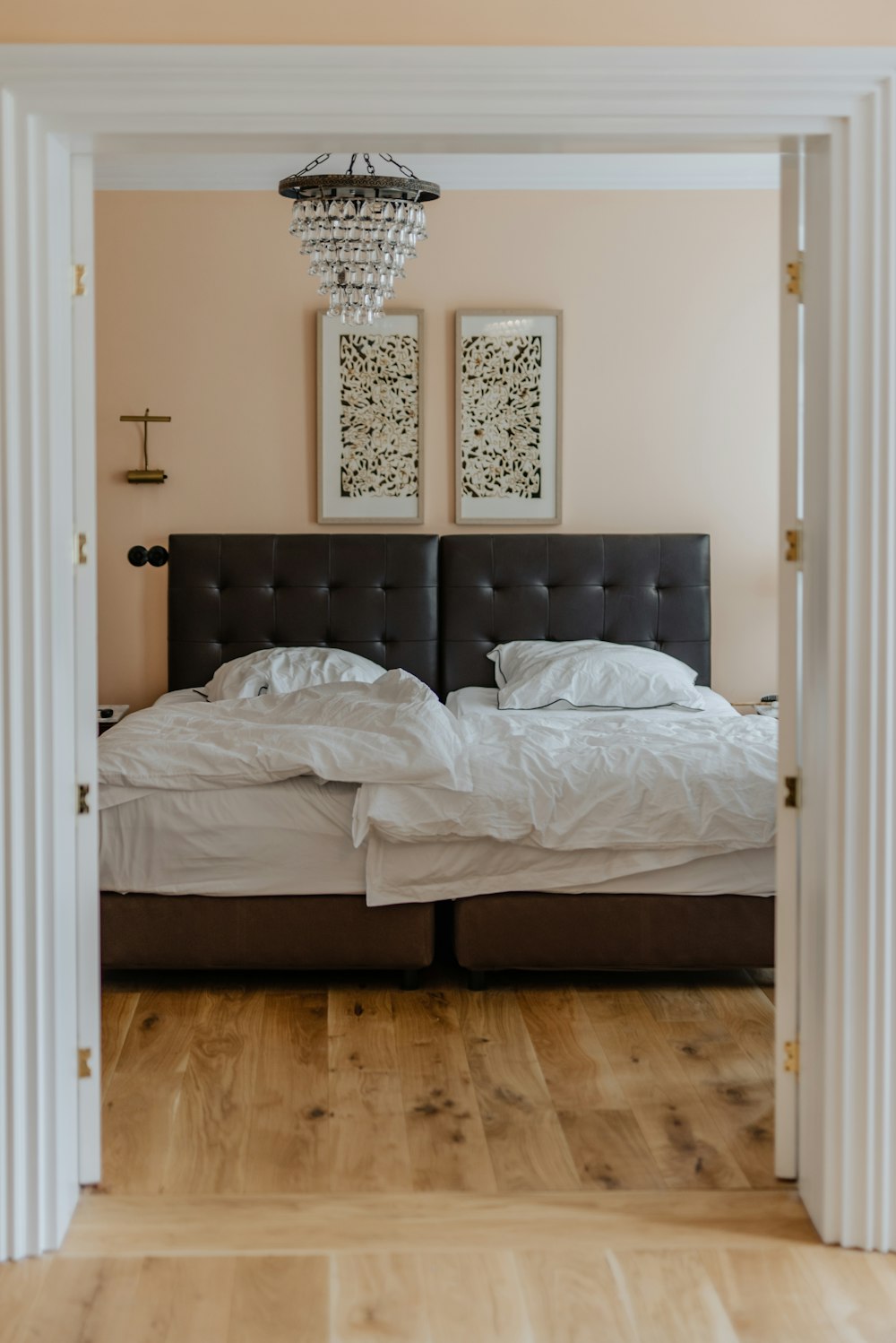 white bed linen on bed