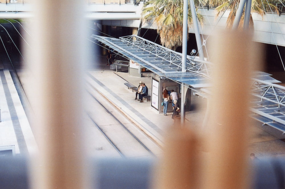 people walking on sidewalk during daytime