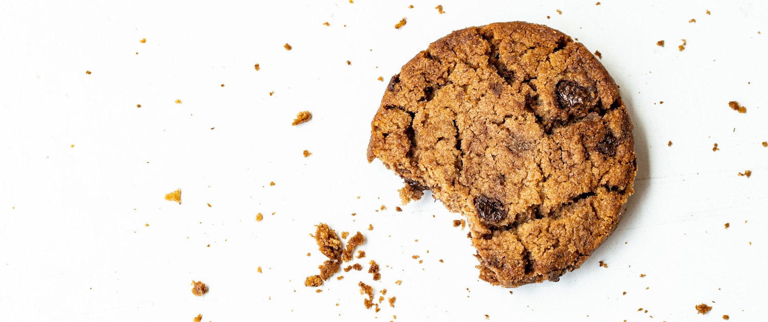 brown round cookie on white surface