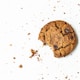 brown round cookie on white surface