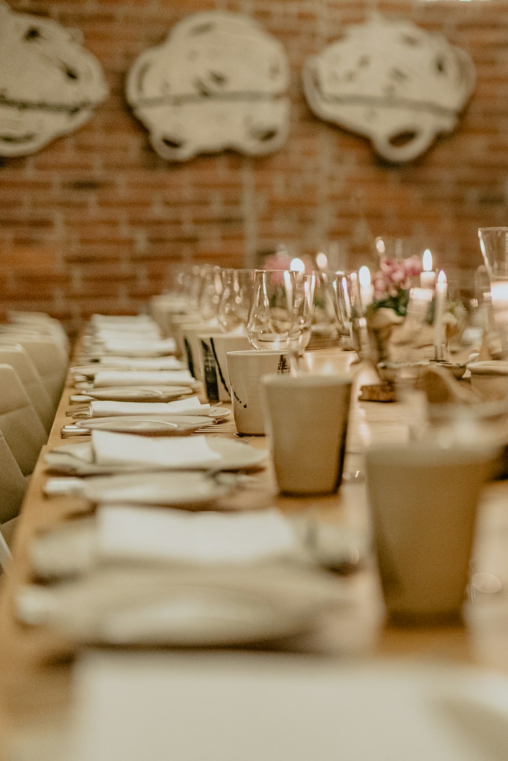 white ceramic mugs on table