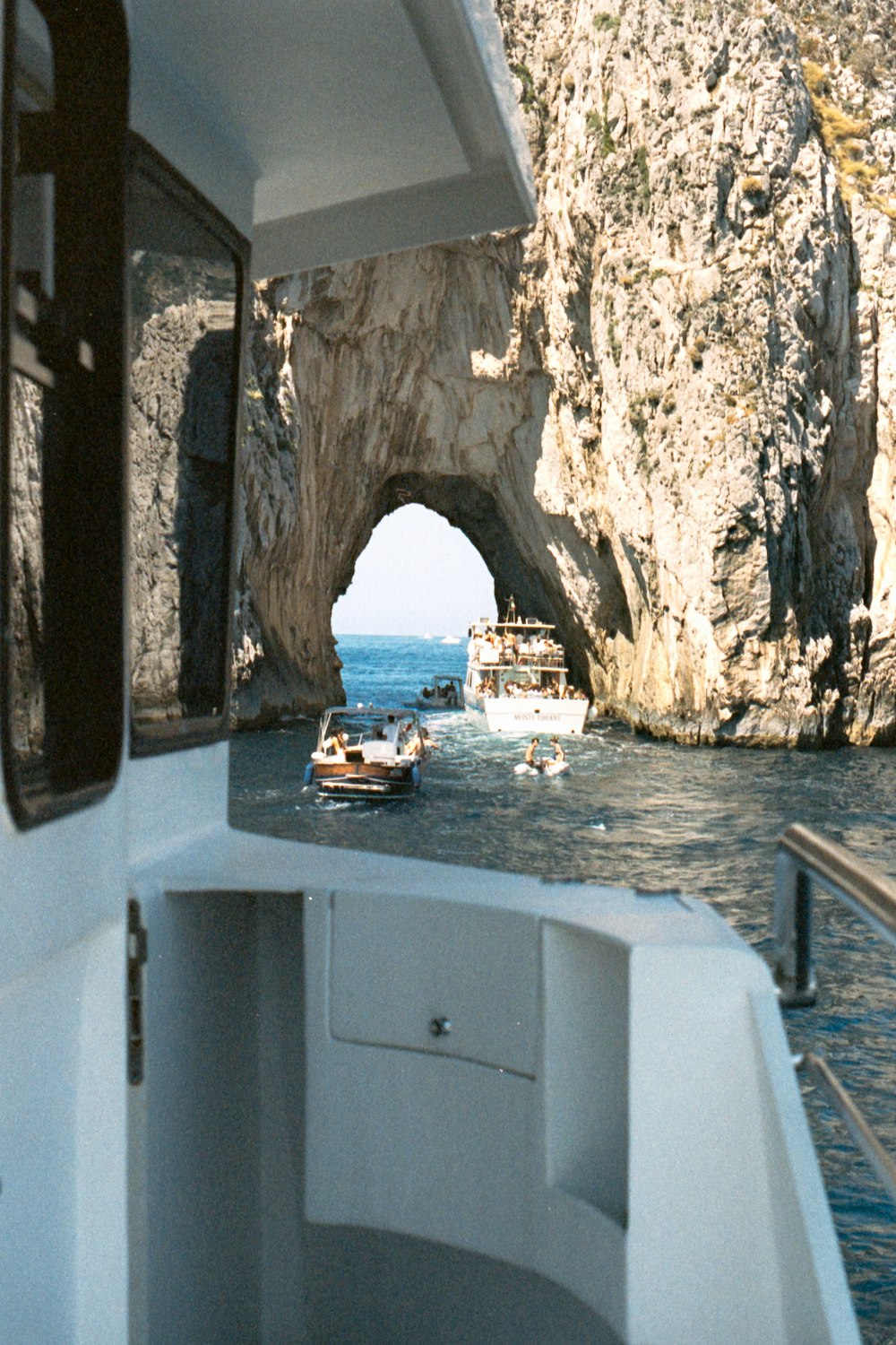 white and blue boat on sea during daytime